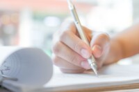 Hand mit Stift